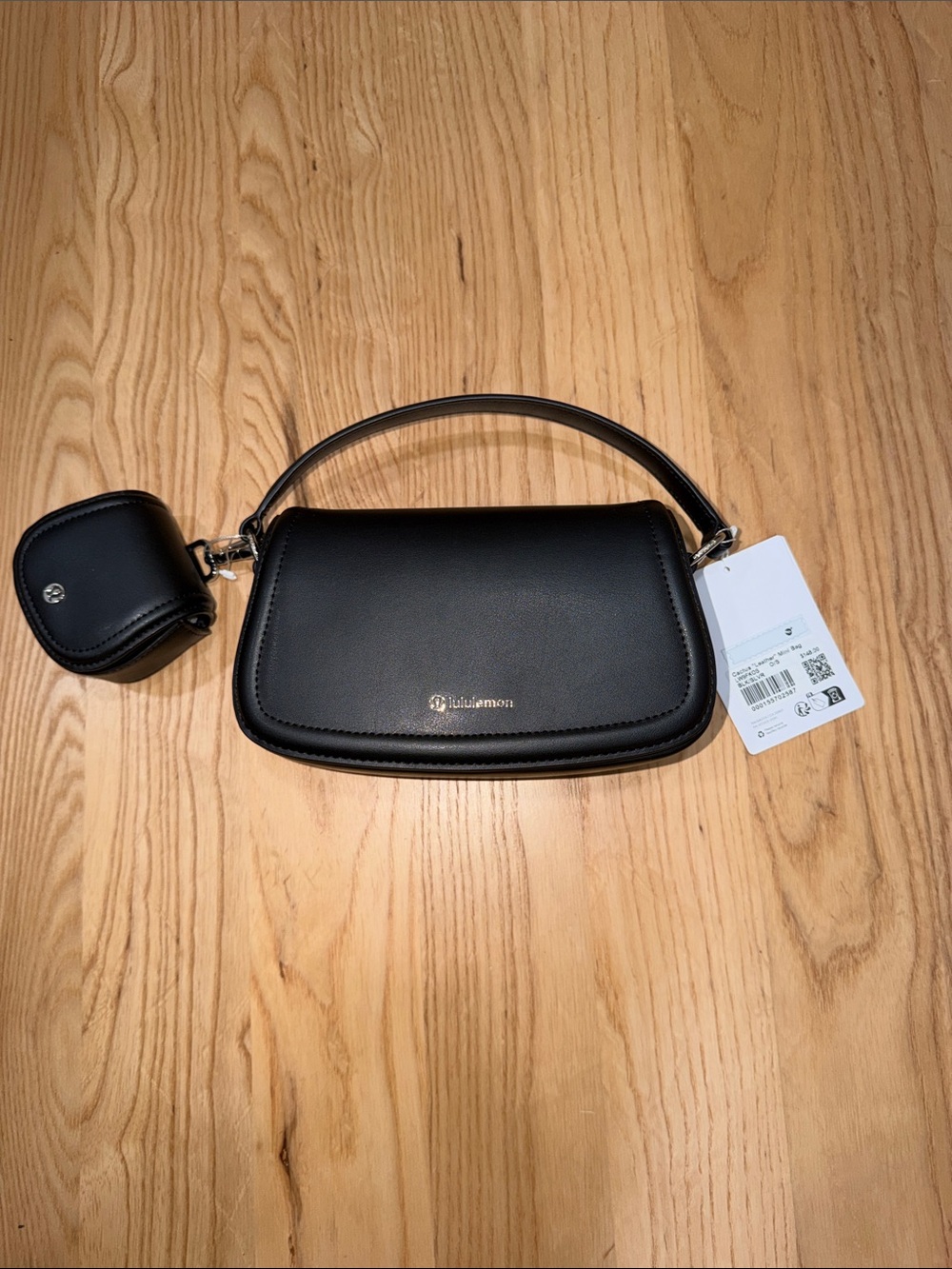lululemon athletica Black Leather Mini Shoulder Bag with detachable EarPod case